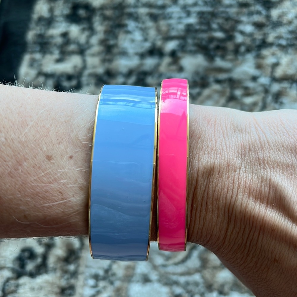 J. Crew set of 2 hot pink and periwinkle bangles with gold accenting.
